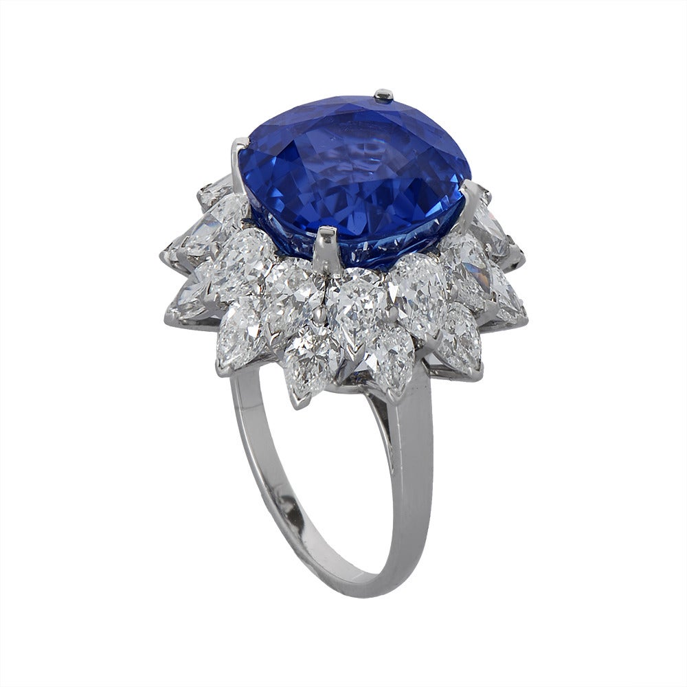 An 11ct unheated Ceylon sapphire ring surrounded by a marquise diamond skirt by Bulgari. Circa 1980.

Accompanied by SSEF report number 79114 stating that the Sapphire is of Sri Lankan origin with no evidence of treatment.