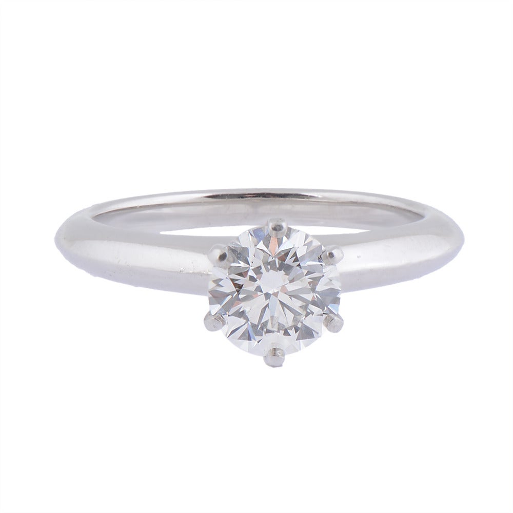 A fine single stone platinum & diamond engagement ring by Tiffany & Co, centered by a 0.97ct brilliant diamond of H colour and VS2 clarity (GIA), signed Tiffany & Co. Circa 1990.

Ring Size - L (can be resized)