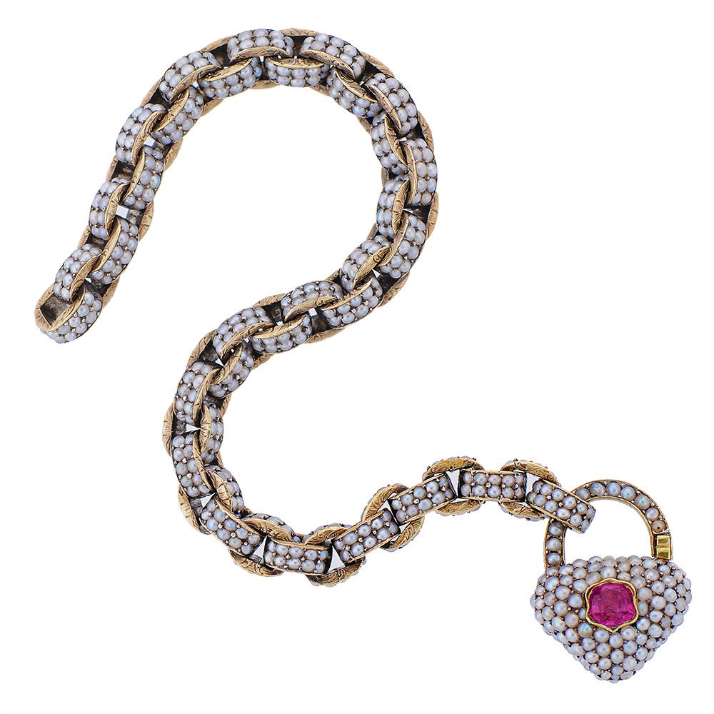 Gold, Ruby and Seed Pearl Bracelet with Heat-Shaped Locket Pendant