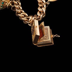 Spectacular Gold Curb Bracelet with Six Gold Charms