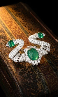 Art Deco Carved Emerald Diamond Brooch in Platinum, Circa 1920-1940