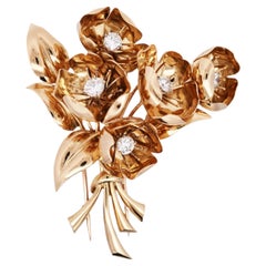 Van Cleef & Arpels, broche en forme de fleur de renoncule en or 18 carats sertie de diamants
