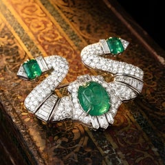 Art Deco Carved Emerald Diamond Brooch in Platinum, Circa 1920-1940