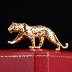 Broche « Panthère » en or jaune 18 carats et émail, Cartier, fin du XXe siècle