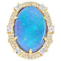 10.98 Carat Lightning Ridge Oval Black Opal and Diamond Yellow Gold Ring