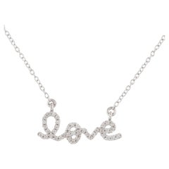 Collier pendentif Love en or blanc avec diamants 0,13 carat