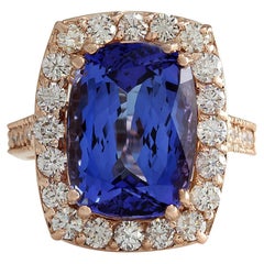 Bague radieuse en tanzanite et diamant : Elegance en or rose 14 carats