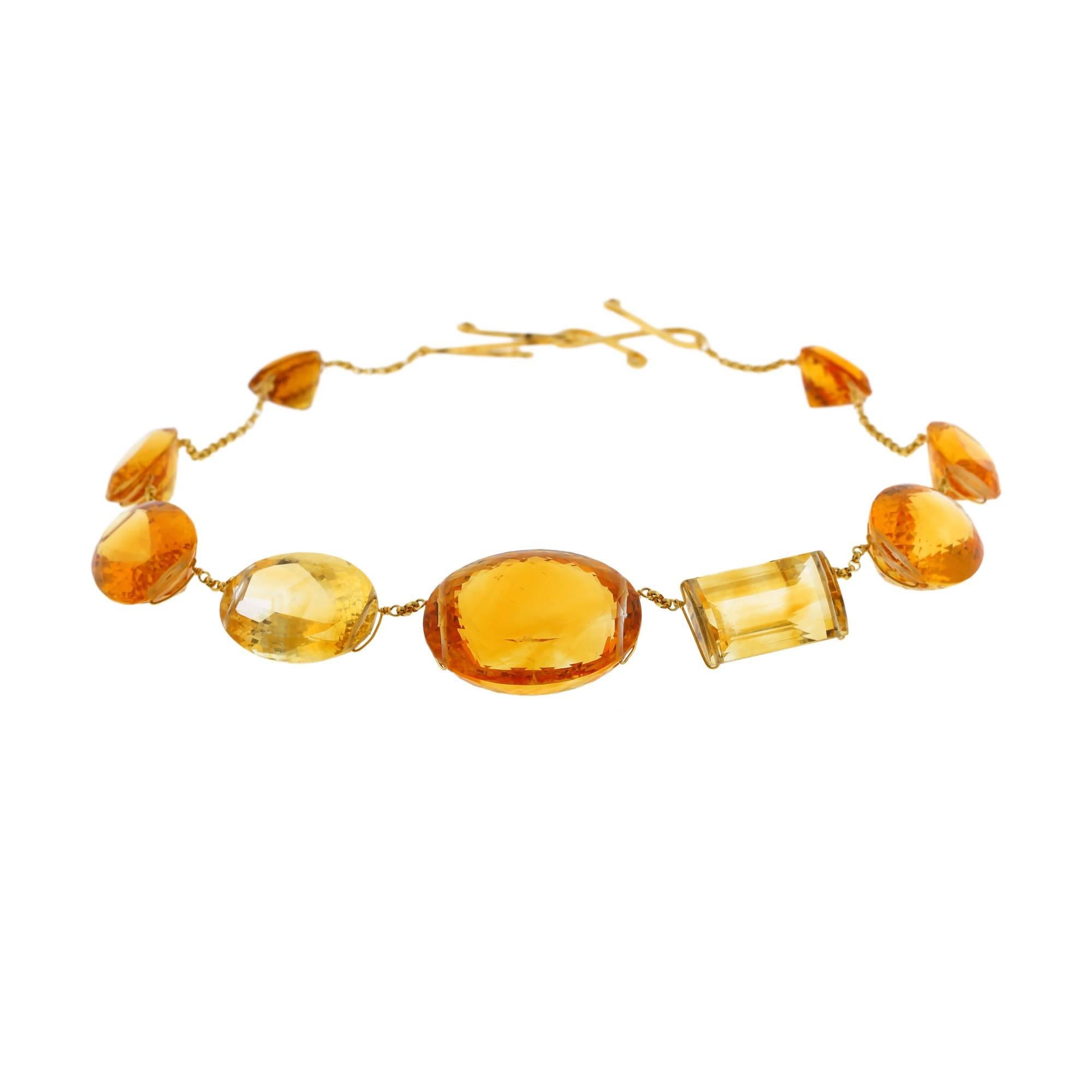 
Every girl should have a necklace of gold to offset her eyes and skin. In this case, a necklace of golden stones.

Citrine in all of its hues is extremely flattering and neutral. This necklace is like sparkling gold that floats around the neck. The