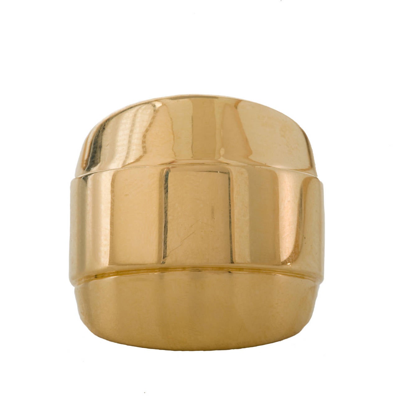 This large gold ring domes slightly above the finger for drama. Yet, it is not a true bubble and so it is comfortable wear all day. It is made of 20k gold for extra warm color and richness. A staple. Can be ordered in a size for the small finger.