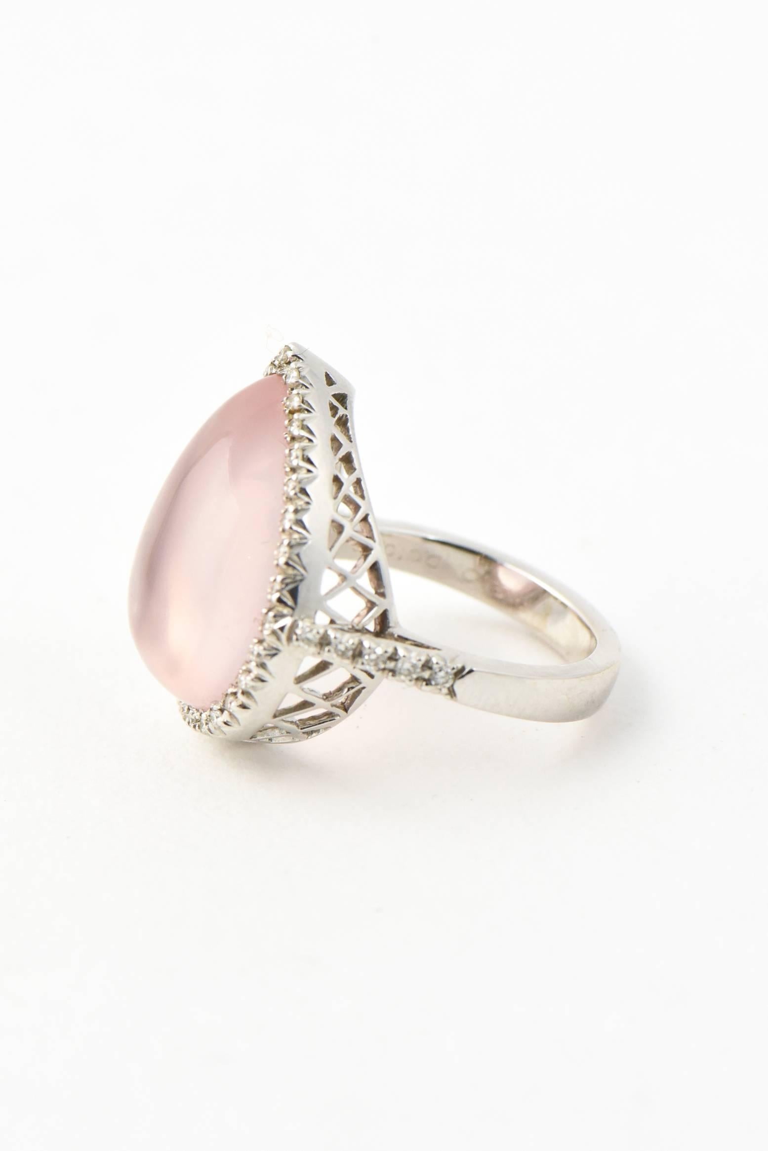 Favor Rose Quartz & Diamond Cocktail Ring crafted from 18K white gold, featuring a teardrop shape rose quartz cabochon set within a bezel of diamonds. 

 Marked 18K a Favero's logo Made in Italy

US size 5 - it can be sized