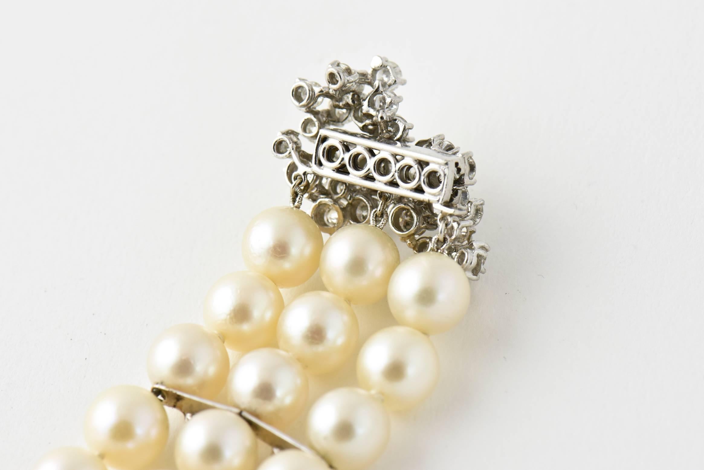 Bead Mid-20th Century Triple Strand Cultured Pearl and Diamond White Gold Bracelet For Sale