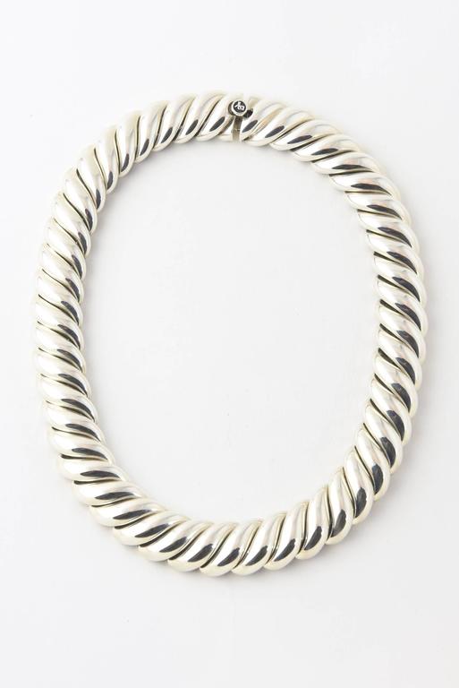 Sterling silver Necklace, 19mm wide Push-button clasp.

About David Yurman:
In 1980, sculptor-turned-jeweler David Yurman introduced his eponymous collection. His artistic, sculptural pieces were a refreshing new interpretation, but David Yurman