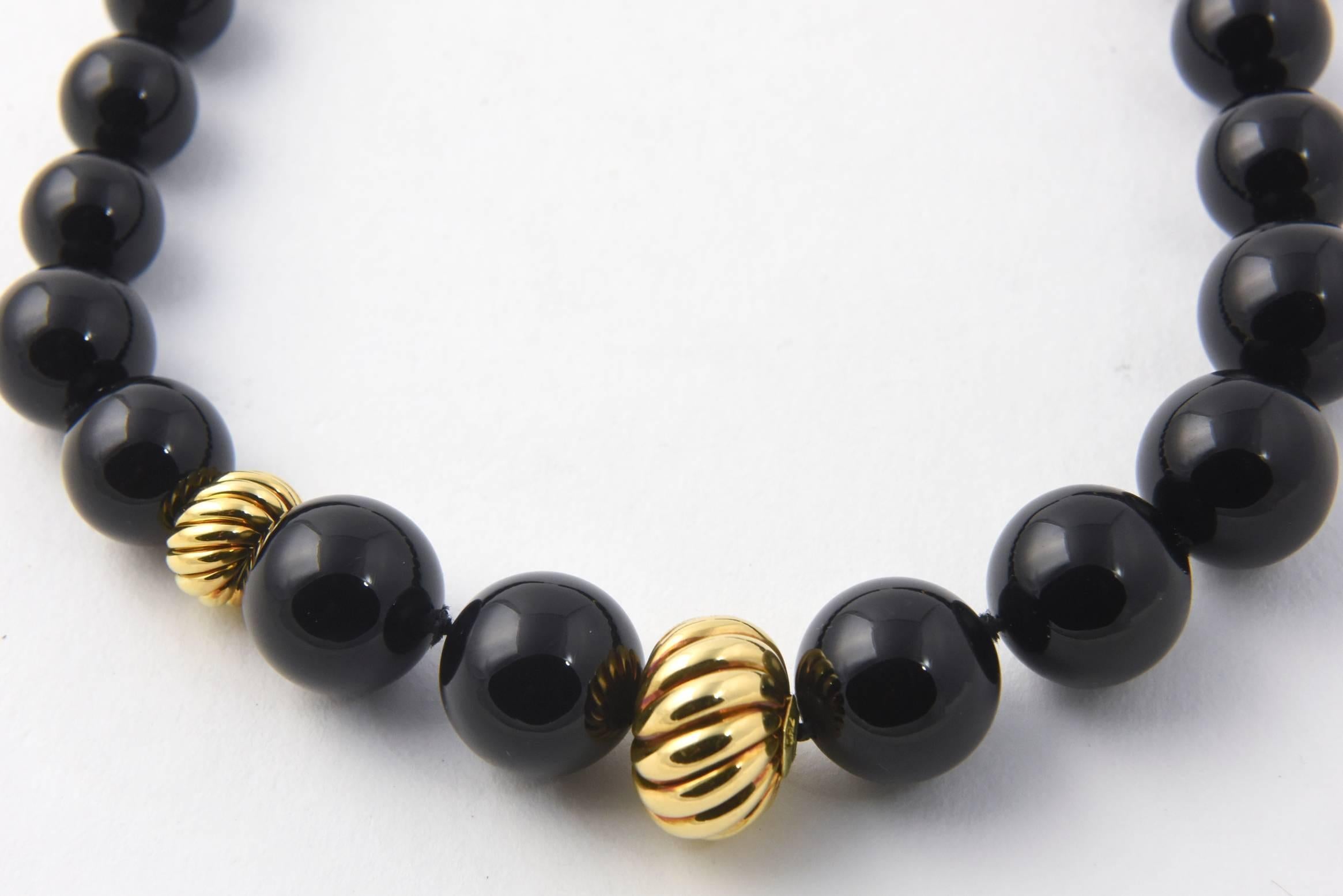 David Yurman signature collection black onyx necklace with 18K gold bead accents and hook clasp.