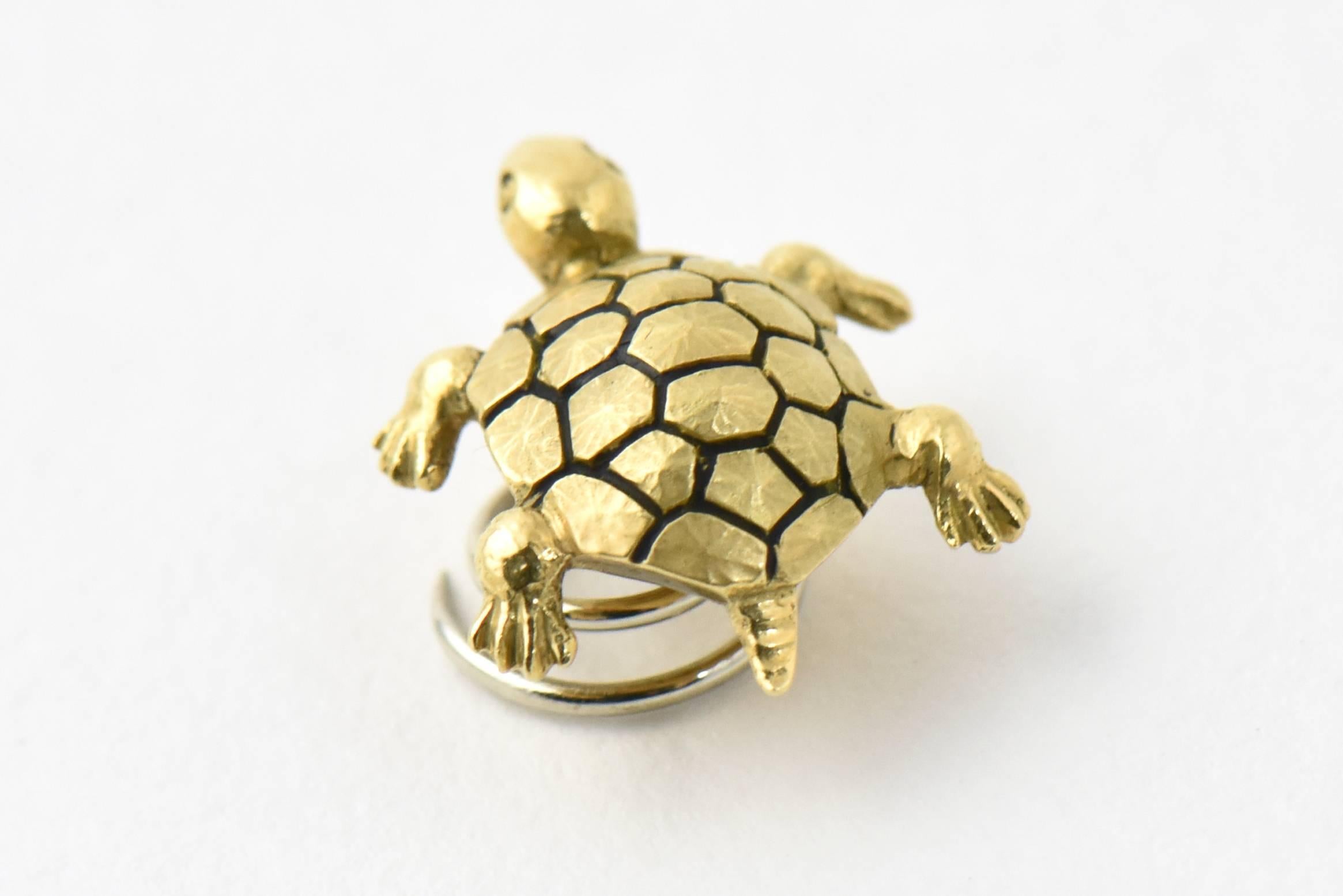 18K gold and enamel turtle pin with corkscrew back that can be used on hair, lapel, veil, sweater, or hat. Marked 