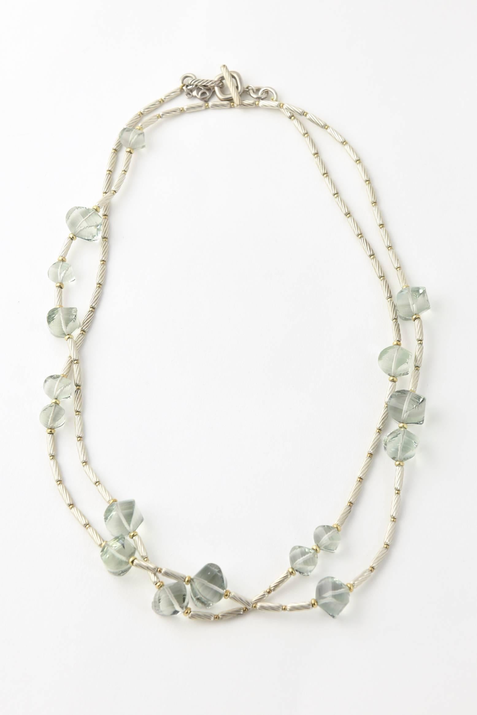 18K yellow gold and sterling silver David Yurman tone-tone necklace featuring beaded prasiolite stations with toggle closure.

Marked with Yurman hallmark, 925 and 750