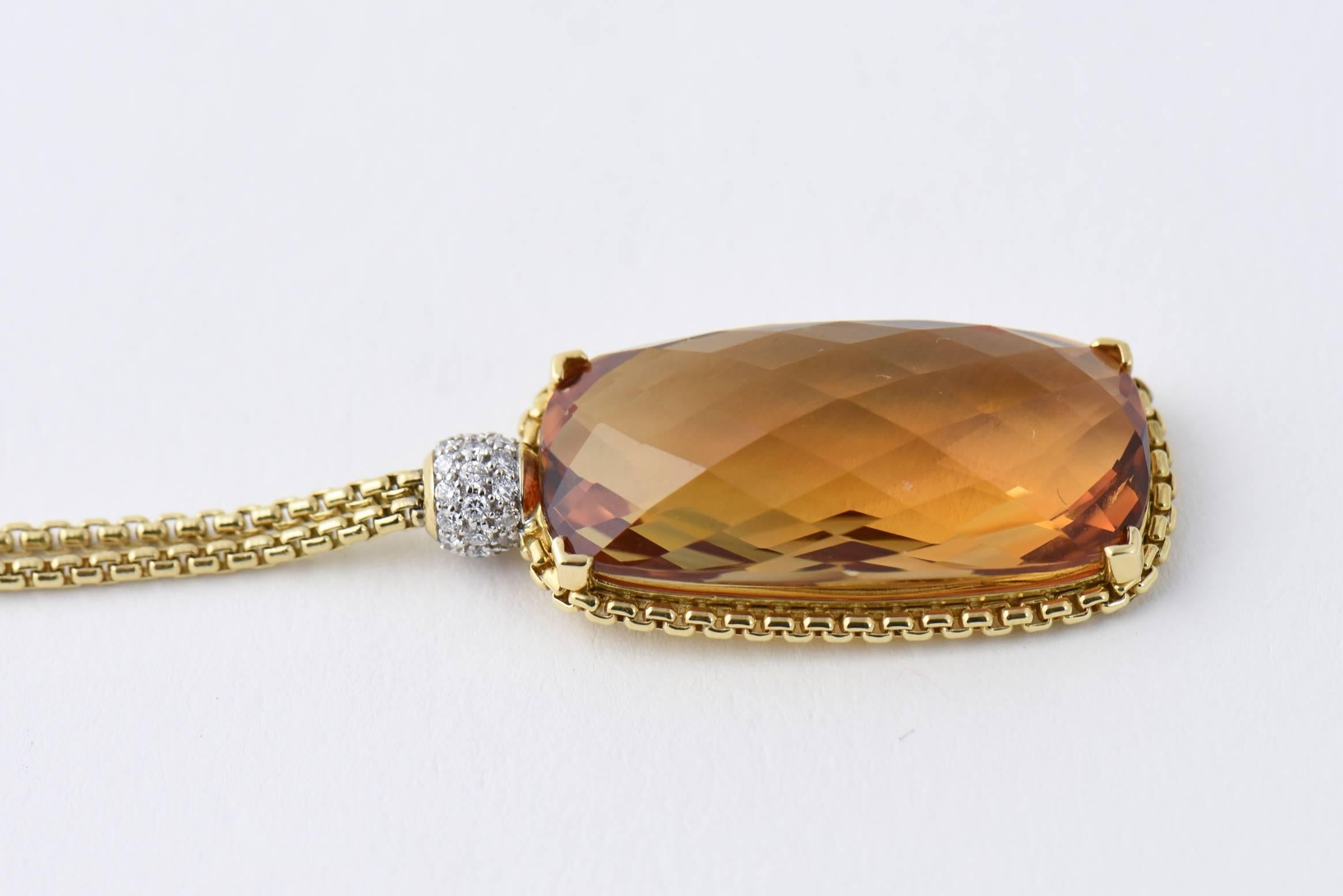 David Yurman 18k yellow gold necklace featuring a cable accented rectangular faceted citrine hanging from a pave diamond ball.  This piece has a lobster closure.