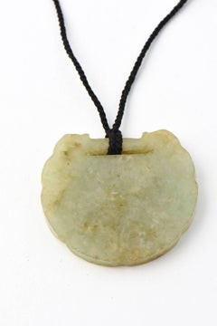 Carved and Etched Jade Pendant on Cord