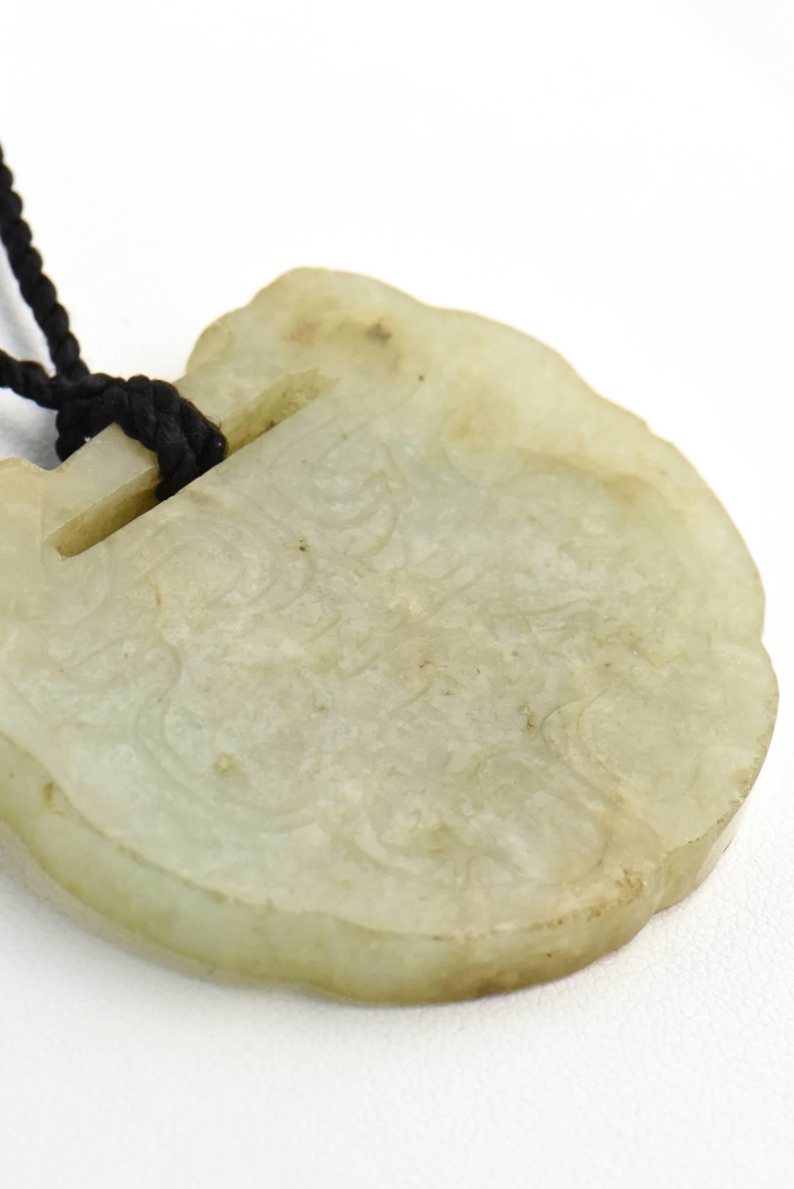 Mixed Cut Carved and Etched Jade Pendant on Cord For Sale