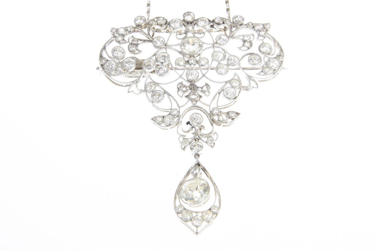 Exquisite Diamond Platinum Belle Époque Brooch, featuring a magnificent free formed organic design, which at one time was quite the fashion statement when sewn onto Her Majesty's Royal evening ballgowns.  Staying pure to its classic Belle Epoque