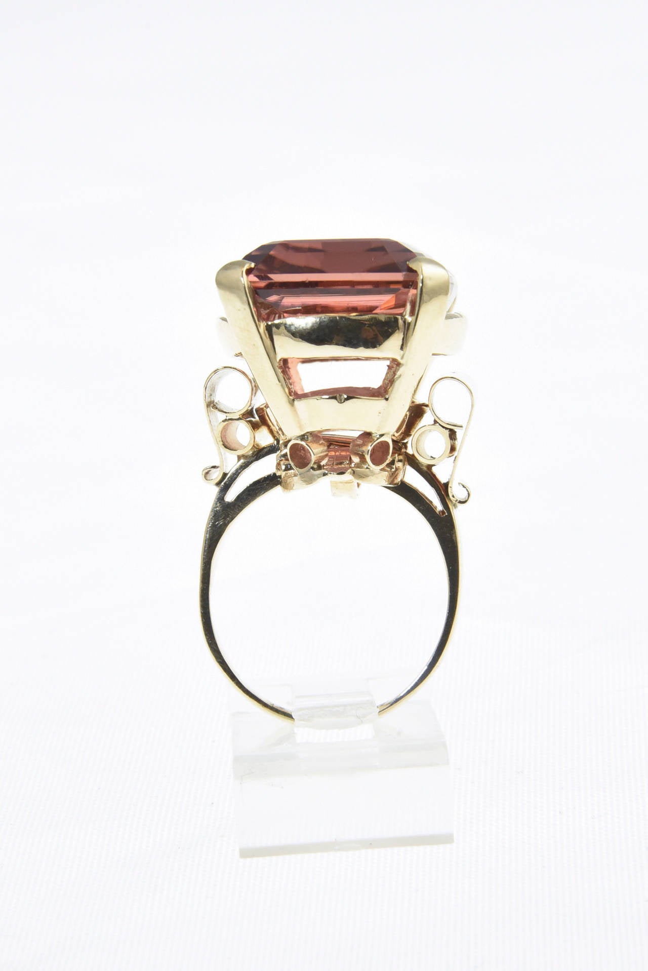 The Tourmaline is exquisite. The stone weights just over 32c.  It is a clean stone with a lovely rare color.  The 14k yellow gold mounting as scroll shoulders.

US size 7.25.  It can be sized.