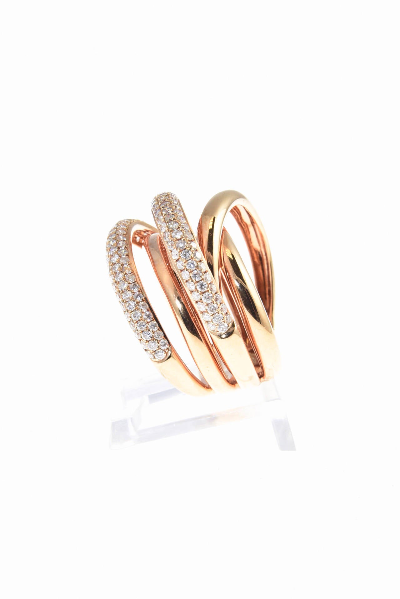 Beautifully made 18k Rose gold ring with pave set diamonds bands intersecting with rose color bands.

US size 6.25 

Marked 18k BA