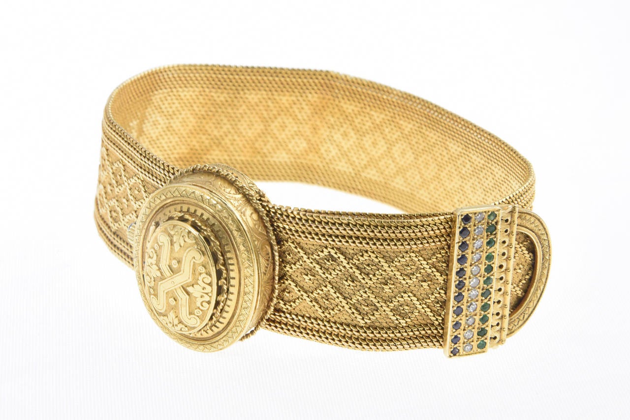 During the 1950's, Victorian designs became in fashion again and with this the Victorian Revival began.  This Hamilton covered watch buckle bracelet is one of the finest examples I have seen from this revival. The workmanship is incredible from the