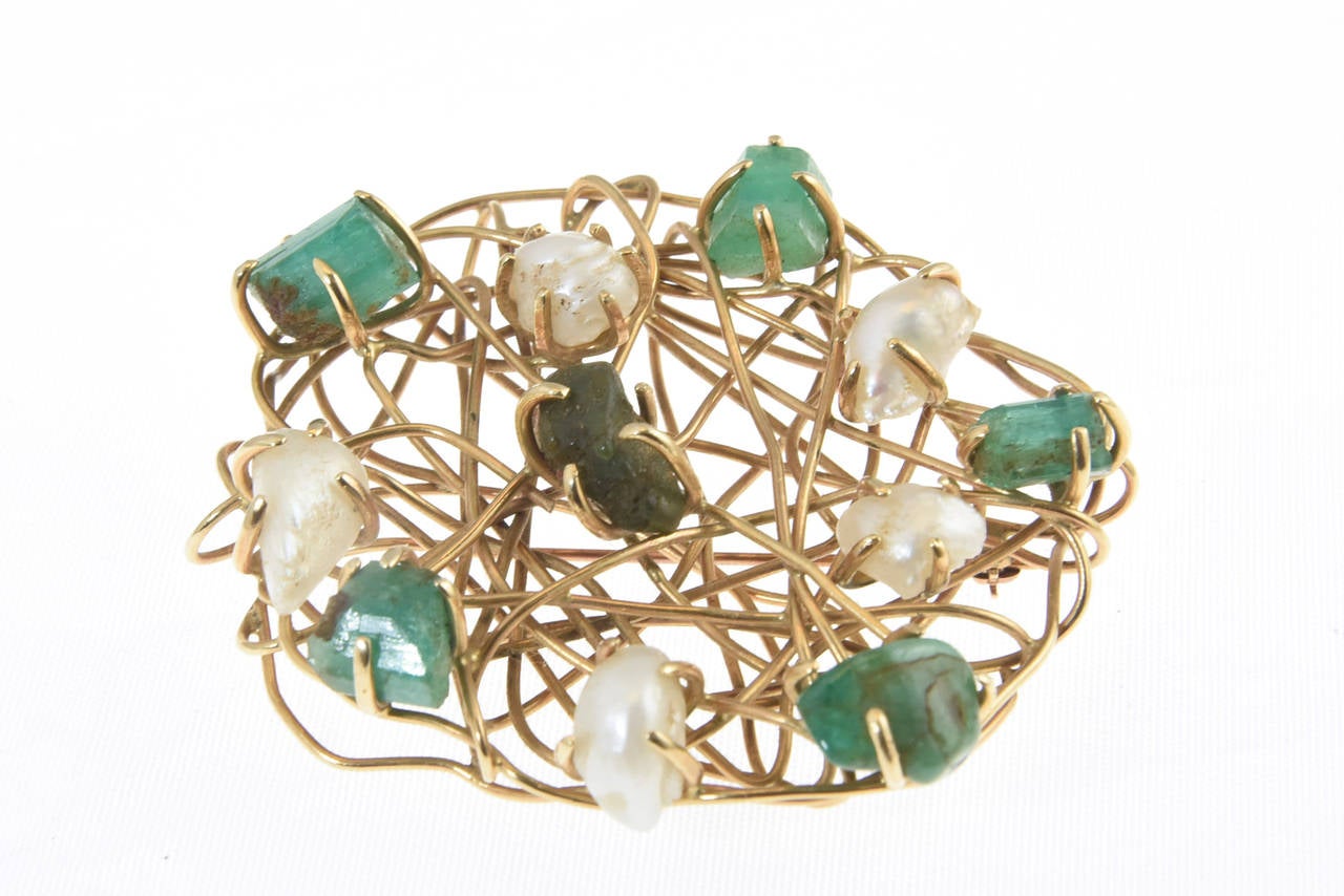 1960's Freeform 14k gold wire cage design accented with culture pearls and emeralds.