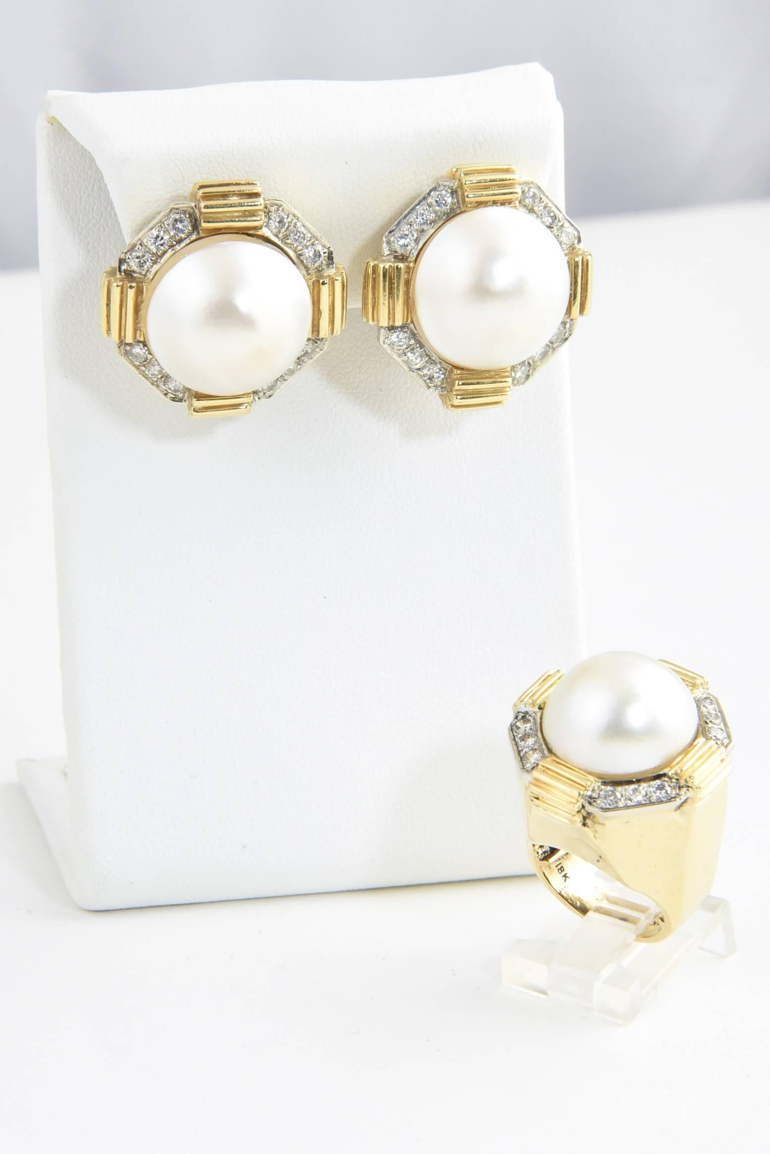 Stunning 18k yellow and white gold mabe pearl and diamond earrings and ring. The mabe pearls in the earrings are 18 mm and in the ring 16mm. Around each mabe pearl, there are twelve round brilliant cut diamonds measuring approximately .06 carats
