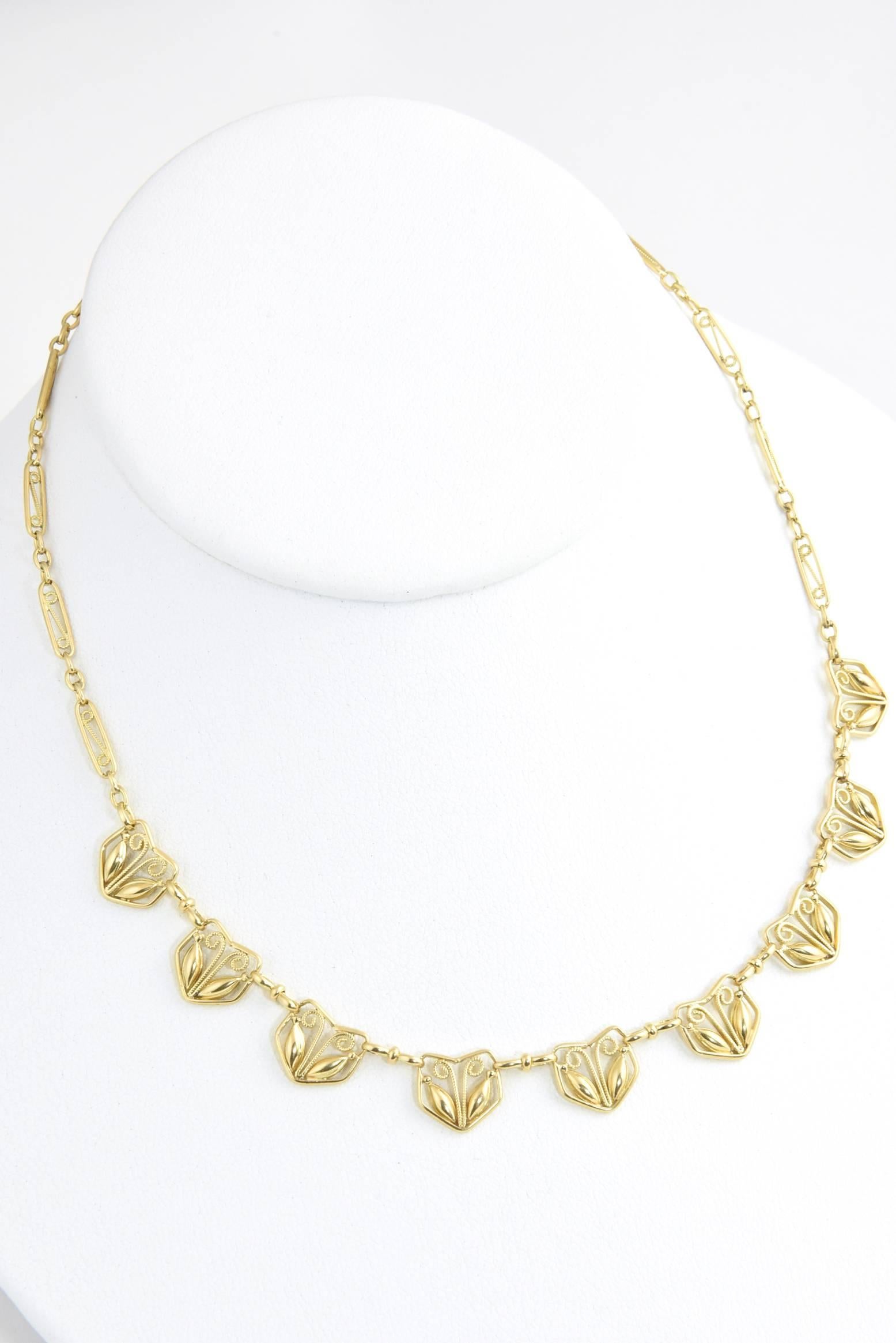 From the Arts & Crafts movement which dates from 1880 - 1910. This beautiful 19 karat gold French necklace is 14.5