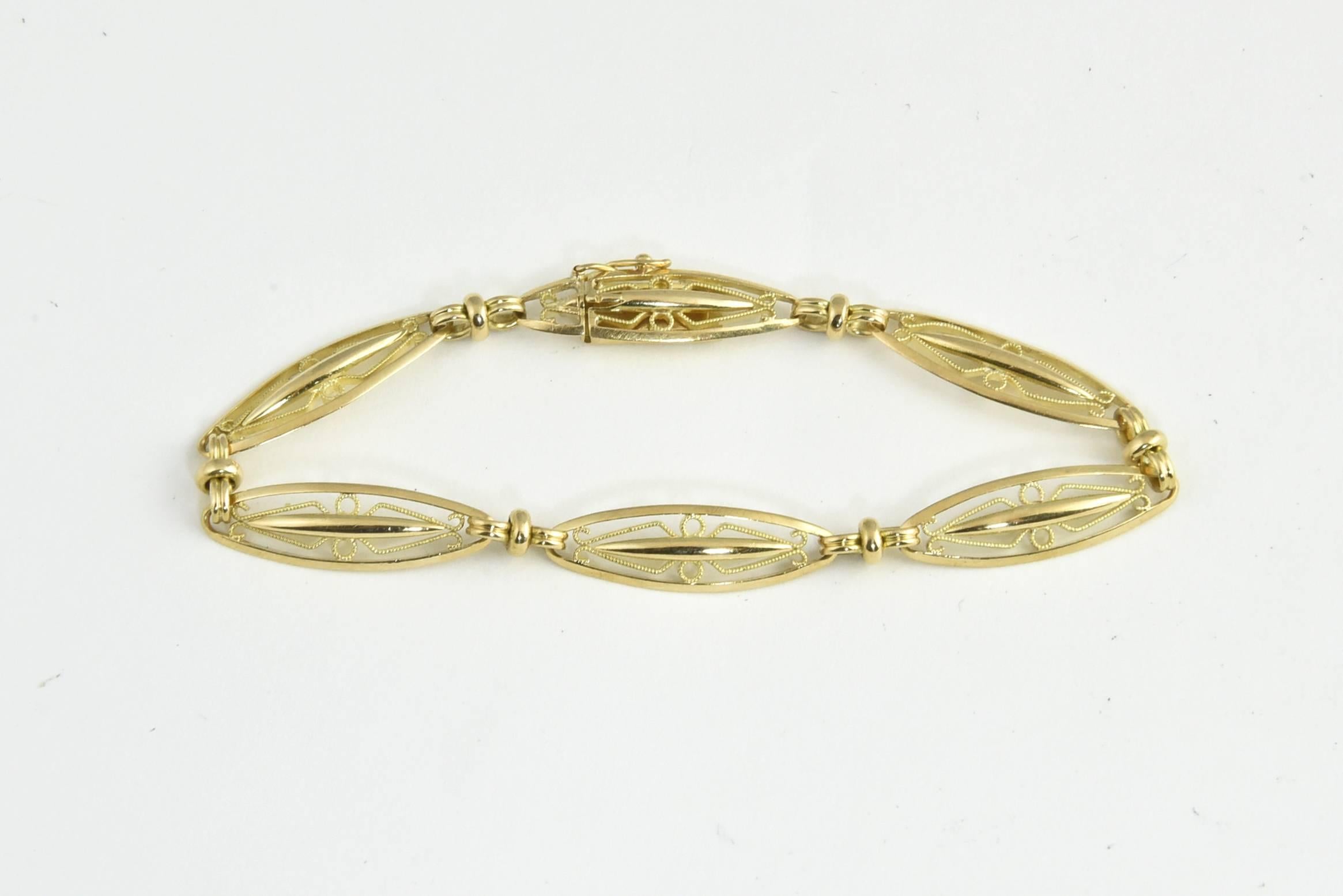 Gay Frères made this beautiful 18k gold bracelet during the Art Deco Era (Circa 1920's).   It features intricate handmade repeating open work navettes each connected by a chain link.  

Created in 1835, the workshop was dedicated to the