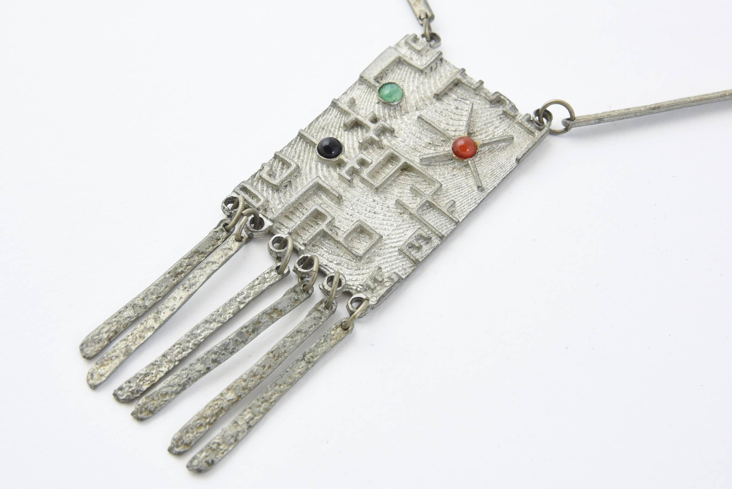 Interesting Space Age Modernist Brutalist Necklace featuring a maze design with gemstones and silver tassels.  Made of sterling silver
Marked Sterling with a AR makers mark
