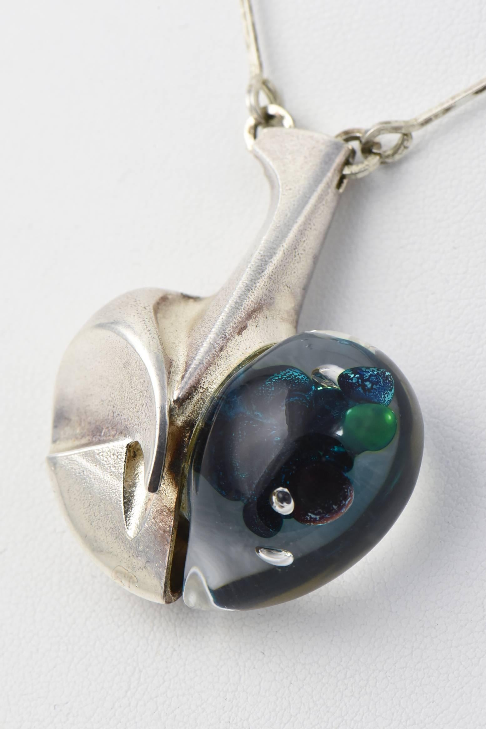 Original 1970's 
Very rare & beautiful space age silver necklace by Finnish silversmith Björn Weckström. Made for his Lapponia workshop in 1972.  
A remarkable pendant by Finnish designer Björn Weckström.  He was inspired by science fiction
