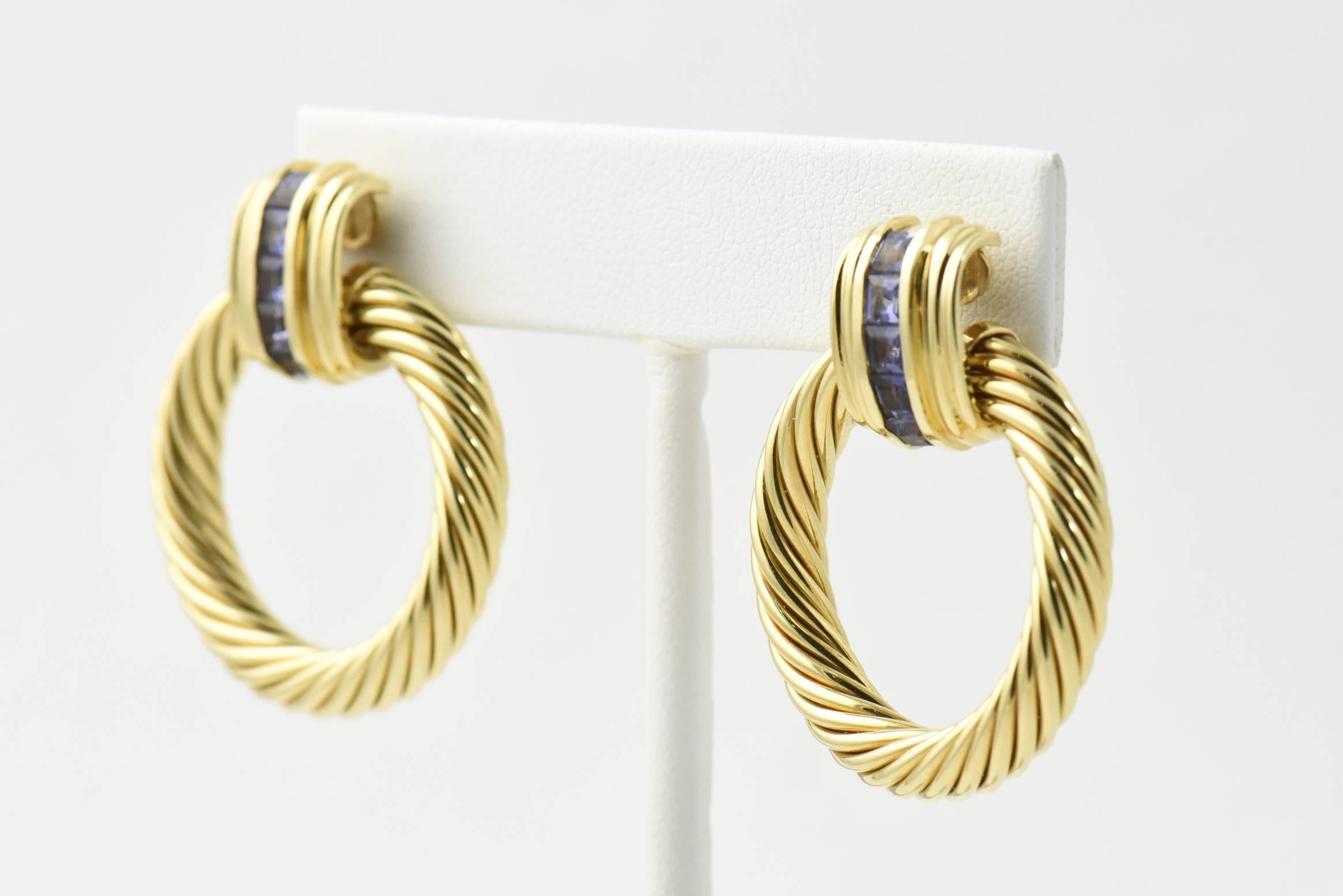 David Yurman 18k yellow gold door knocker earrings with detachable cable circles.  The top section can be worn with or without the bottom.  The center of the top section has a line of channel set sapphires.  Omega post backs.

Without hoops