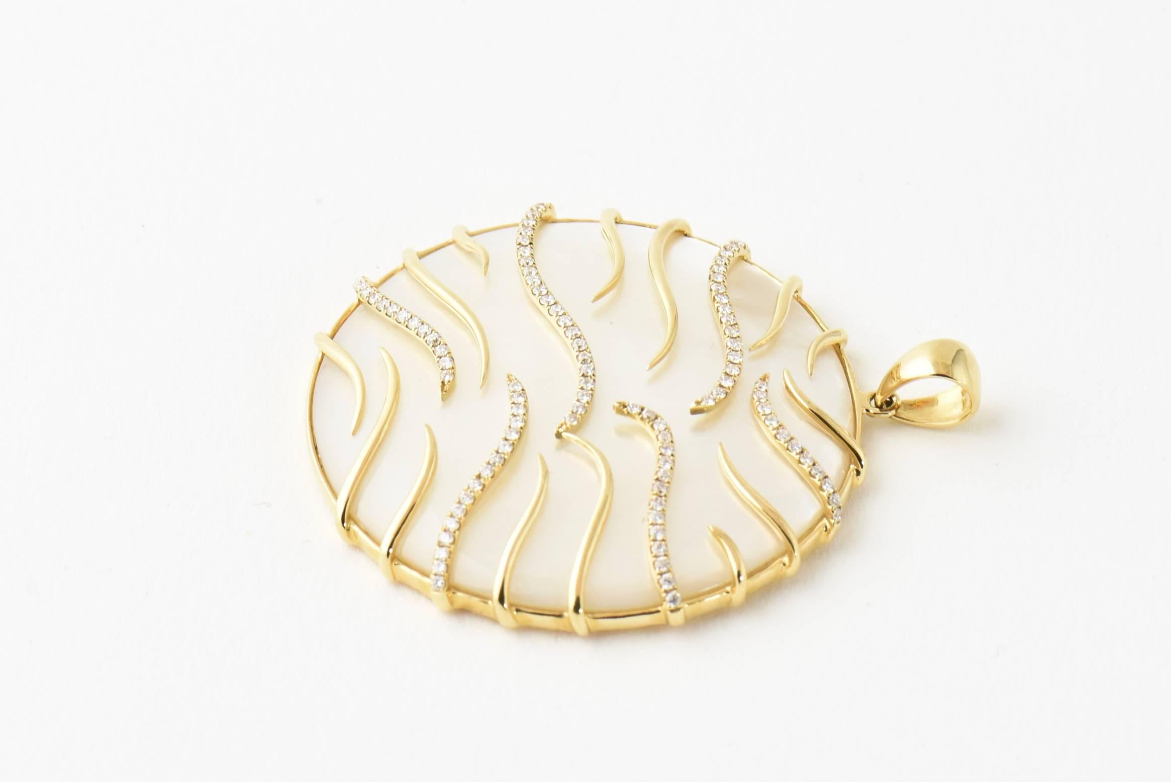 Frederic Sage pendant 18-karat yellow gold settings that emulates a glowing full moon, round mother-of-pearl pendant is encased in gold stripe settings, 41mm (1 3/4