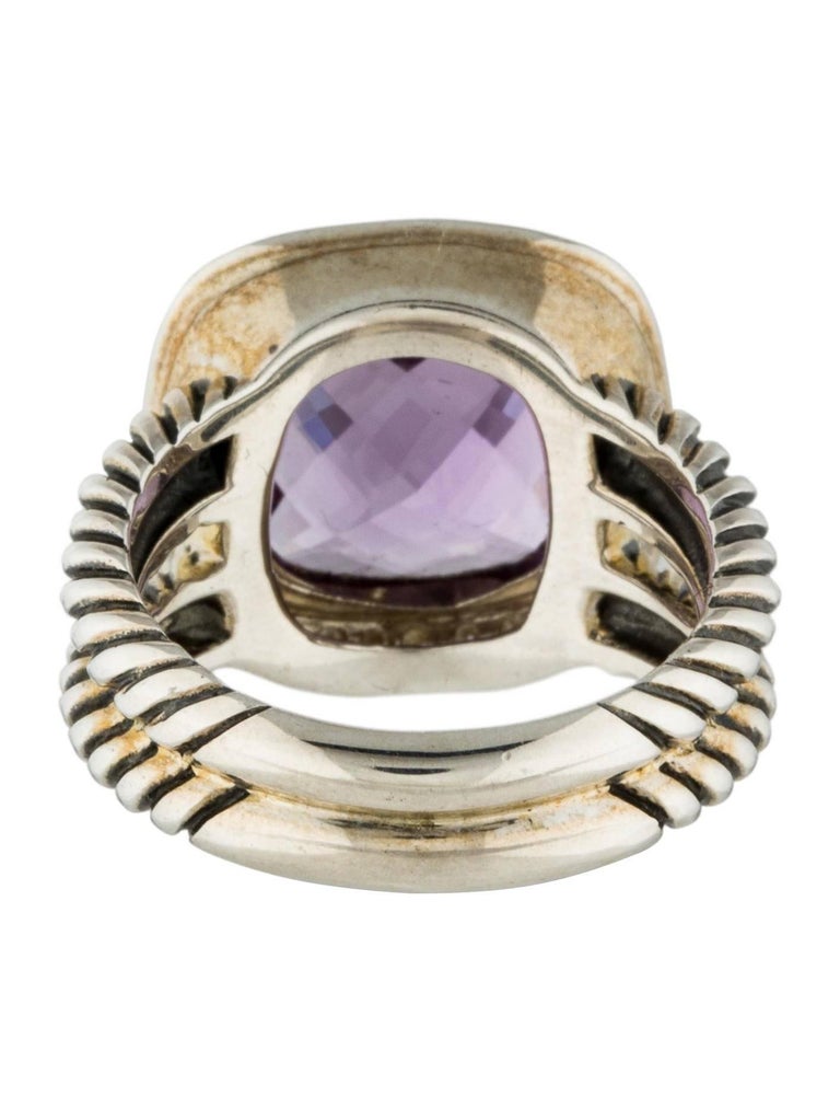 Sterling silver David Yurman Albion cocktail ring with amethyst surrounded by .22 carats of diamonds in a halo with cable textured split shank.  Band with 5mm.

Ring Size: 6.25

Marked 925 with Yurman Hallmark