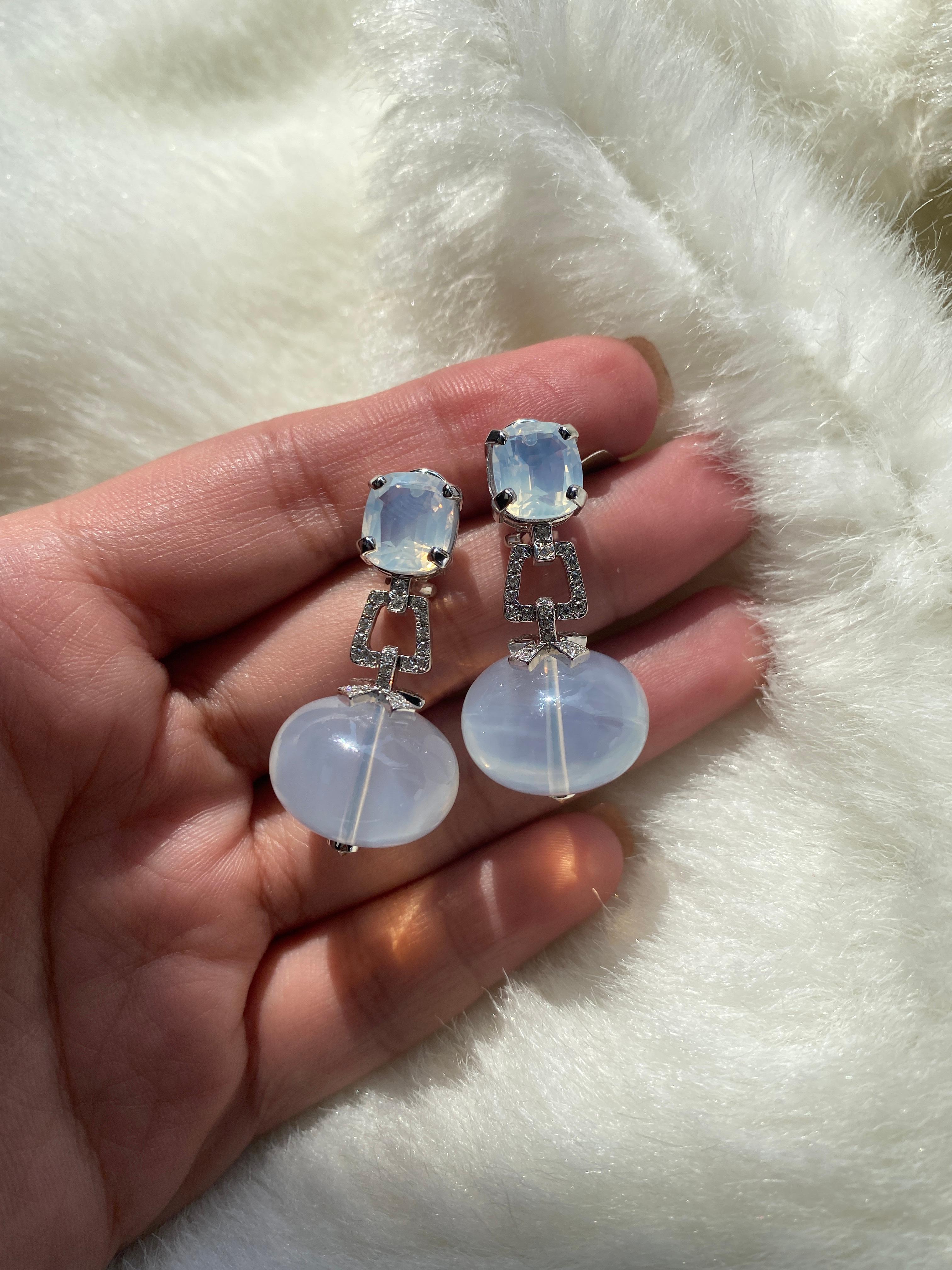 Moon Quartz Cushion Cab & Moon Quartz Bead Earrings with Diamonds in 18k White Gold, from 'G-One' Collection

Gemstone Weight: Moon Quartz- 72.92 Carats
                                
Diamond: G-H / VS, Approx Wt: 0.53 Carats
