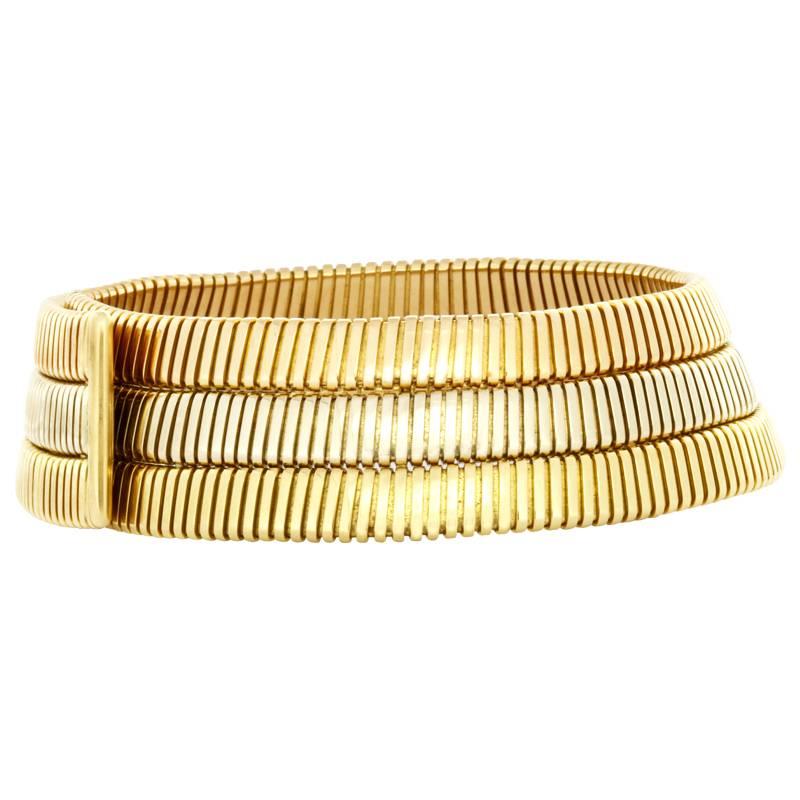 Bulgari tubogas three gold choker necklace, very special thanks to its three different tubogas gold lines: pink gold, white gold and yellow gold. Manufactured end of 1970's beginning of 1980's. 