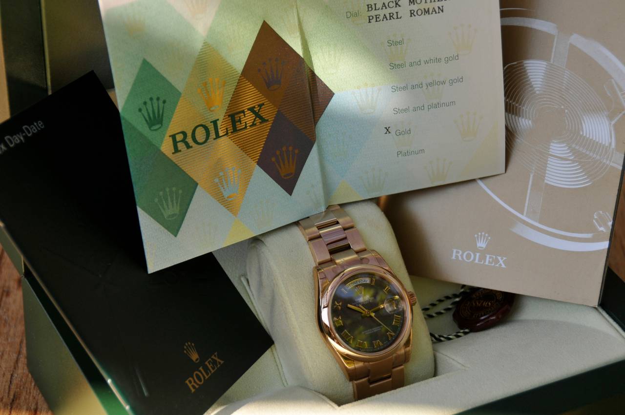 Rolex
Rolex Day-Date Persident in Pink Gold
Ref. 118205
Serial: D85...
Rare Black Mother of Pearl Dial with Pink Gold Roman Index
Oyster Pink Gold Bracelet with Hidden Clasp
Red Tag and Green Oleogram Tag on Caseback
Box and All