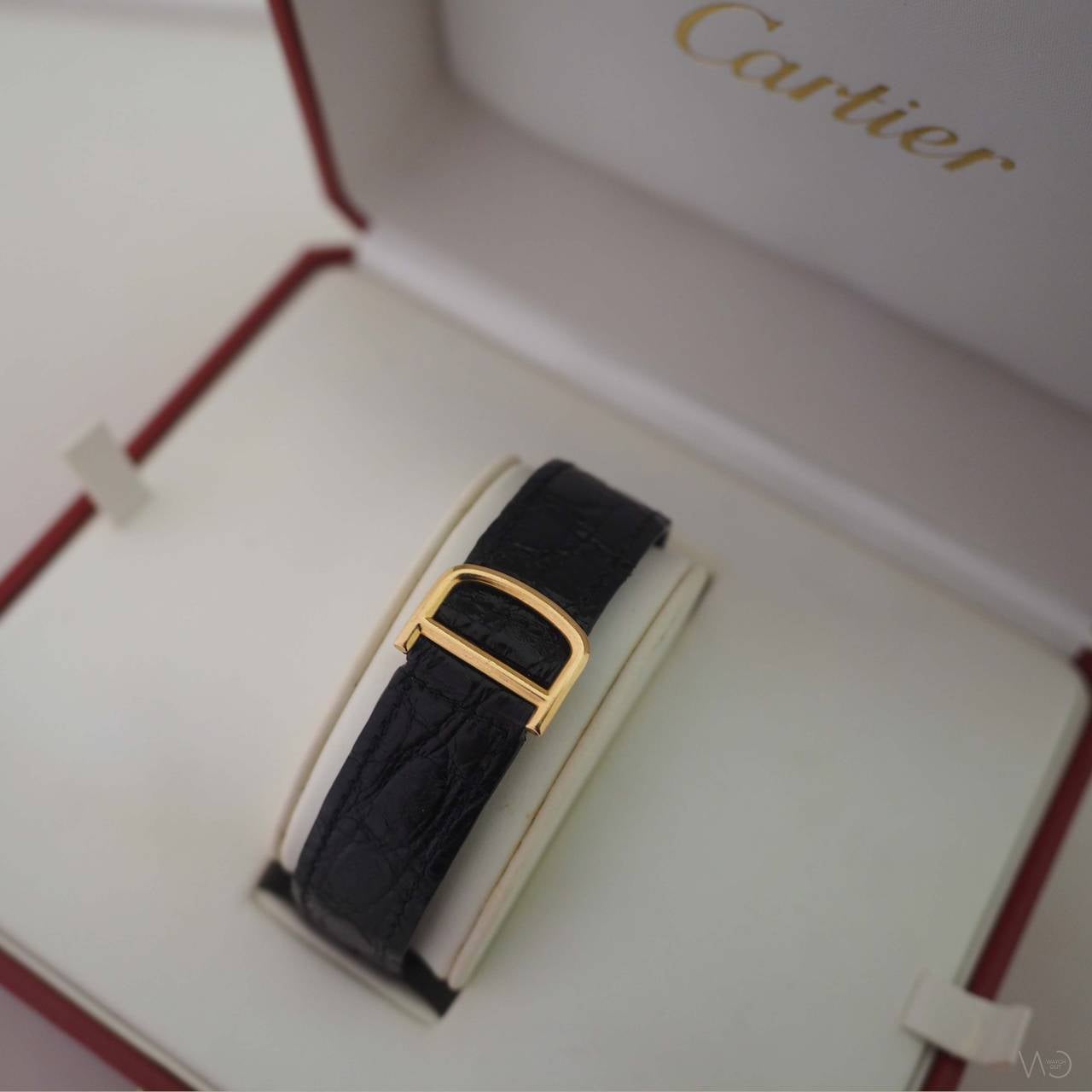 Women's or Men's Cartier Yellow Gold Tank Cintrée Dual Time Zone Wristwatch For Sale