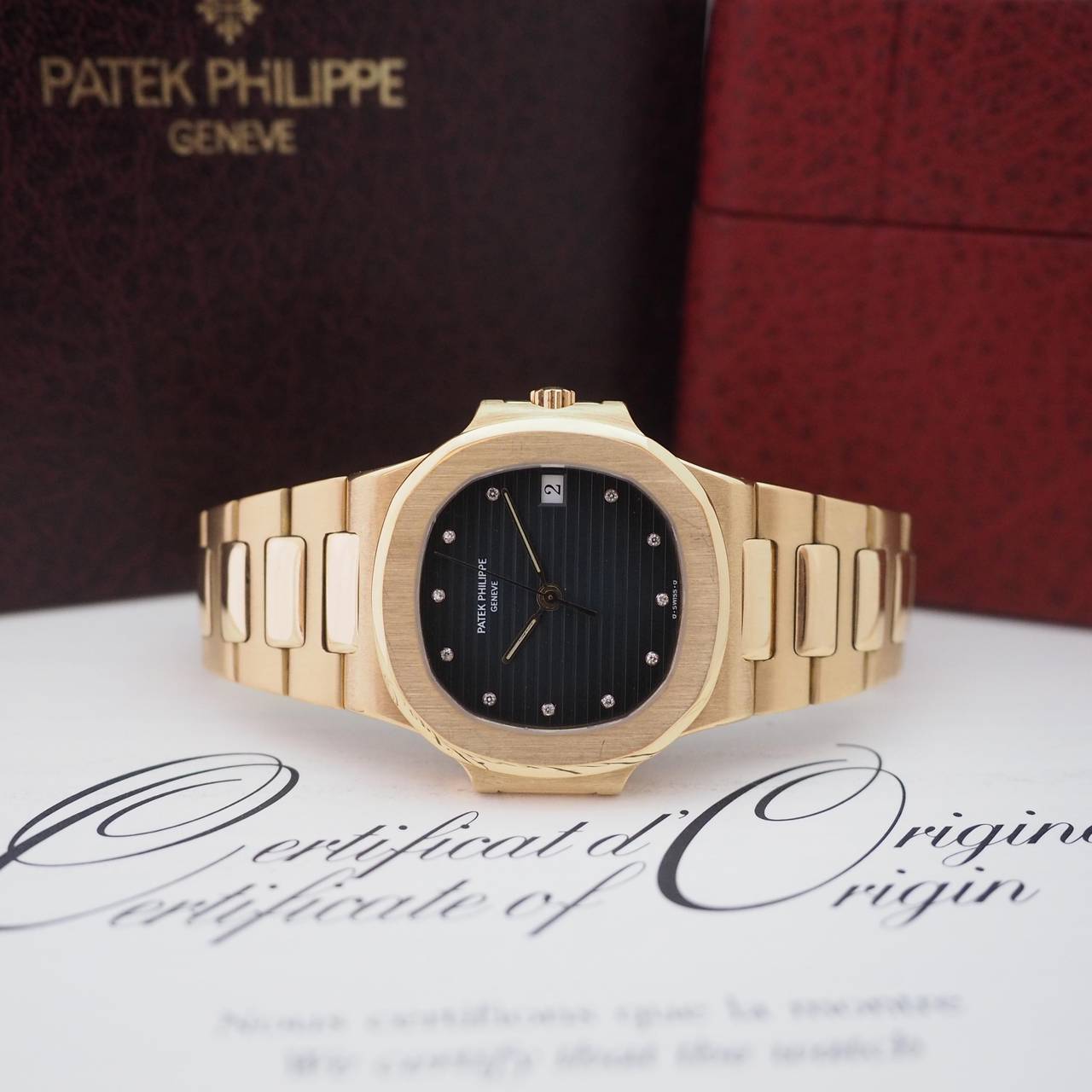 Patek Philippe
Patek Philippe Nautilus
Ref. 3800/1
18K Yellow Gold Case
Deep Blue Dial with Diamonds and Original Black Dial
18K Yellow Gold Bracelet
Automatic Winding
Diameter: 38mm
Year: 1996

Accompanied by Original Box and Certificate