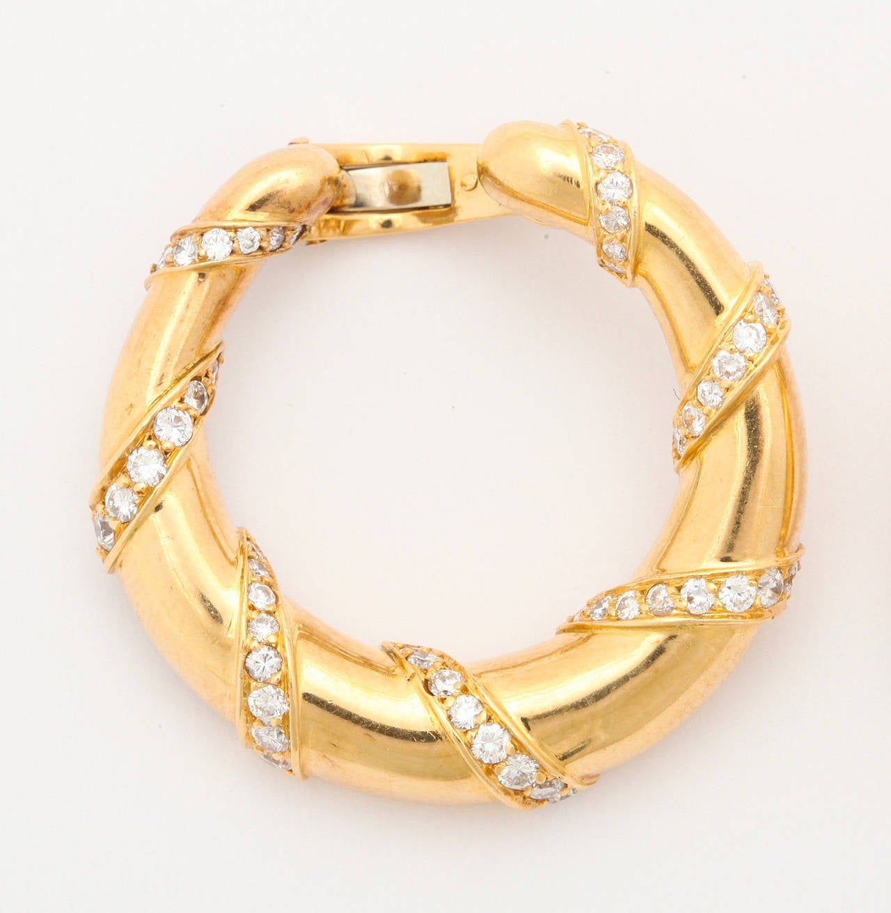 Stunning, wearable, timeless and Cartier- these hoops have it all.  Fully signed, numbered and French hallmarked the creole style hoop is an iconic Cartier design.  The posts for pierced ears can be removed or repositioned for comfort and