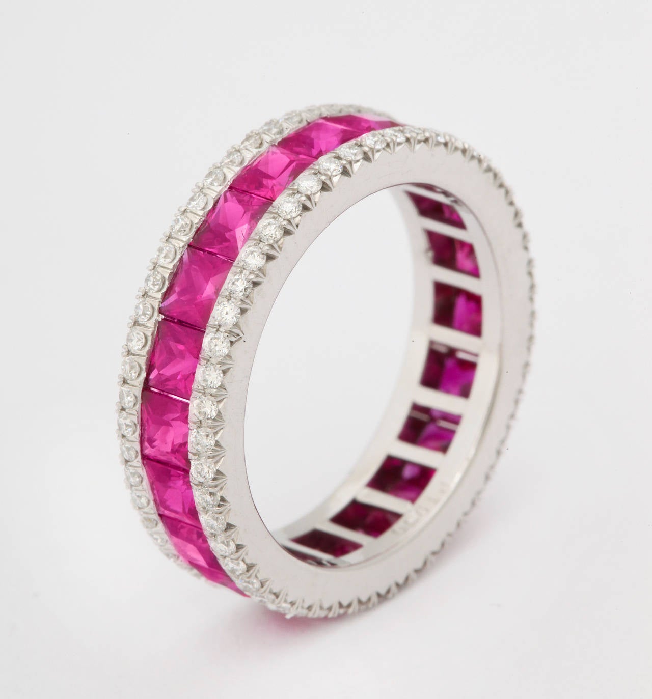 Very finely made platinum, square ruby (app. 3cts) and round diamond (app. 1ct) eternity band ring. The listed price is for a US size 6, but the ring will be custom made to order in your chosen size.  The final price will be dependant upon the size