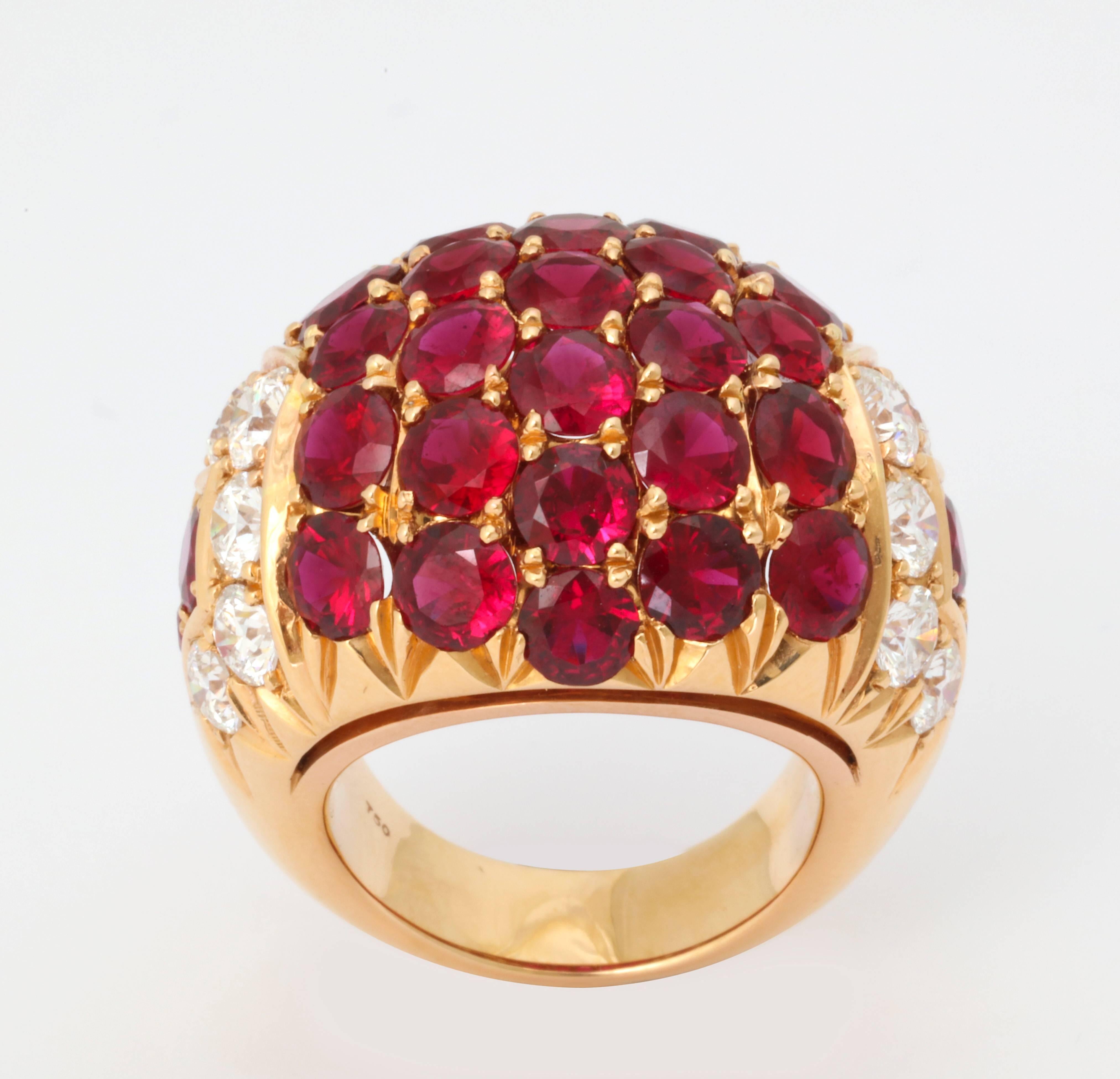 This ring is a wonderful, modern day example of the historically stylish cocktail ring.  The 33 rubies (9.05cts total weight) are the finest examples, mined in Mozambique, and weigh an average of a over 1/4th of a carat each.  They are perfectly cut
