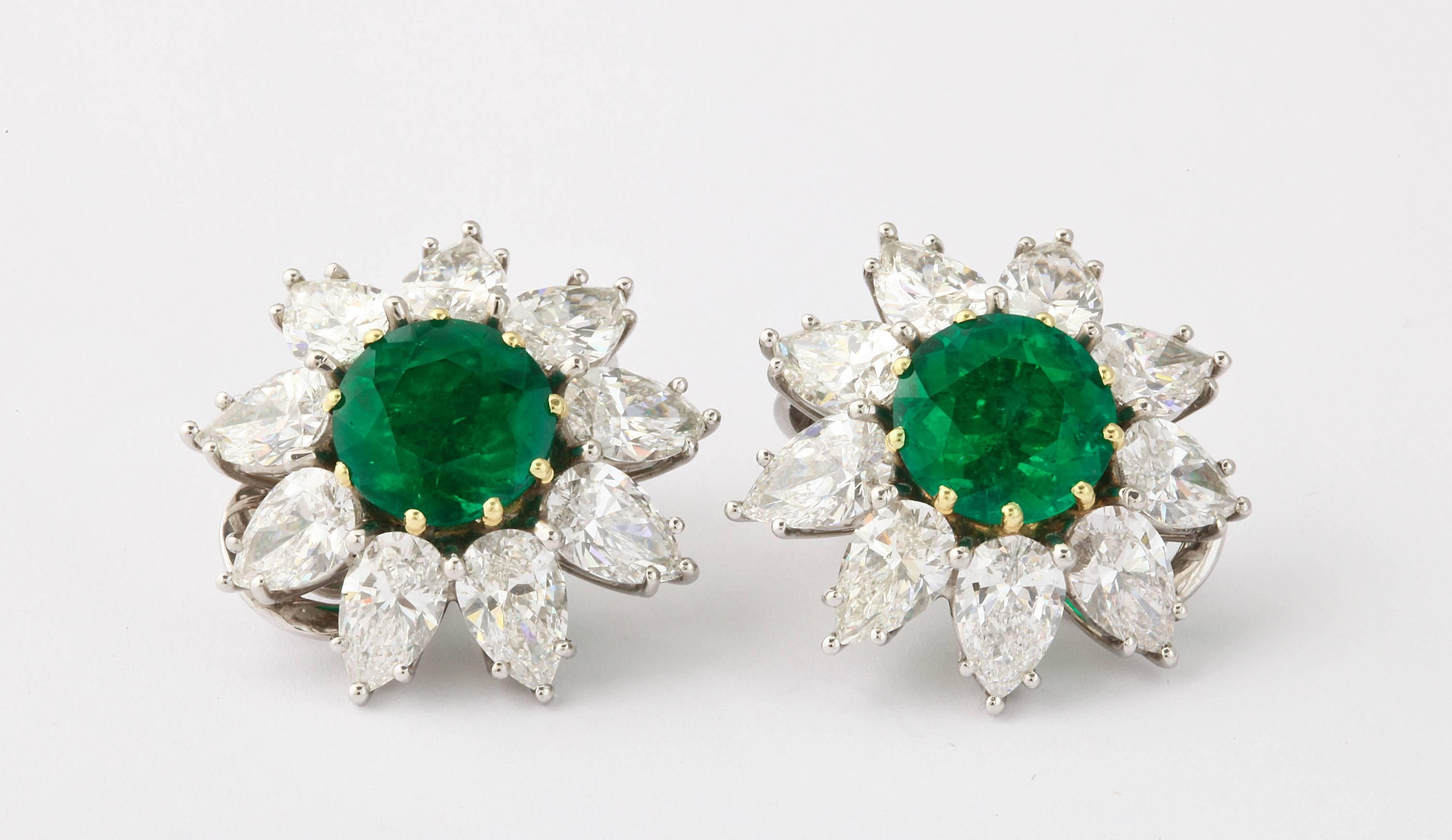 Gem quality round Colombian emeralds are already rare, but a perfectly matched pair is a true find.  Both stones (2.20cts & 2.25cts) are certificated and of Colombian origin, with minor and insignificant amounts of oil which is a traditional
