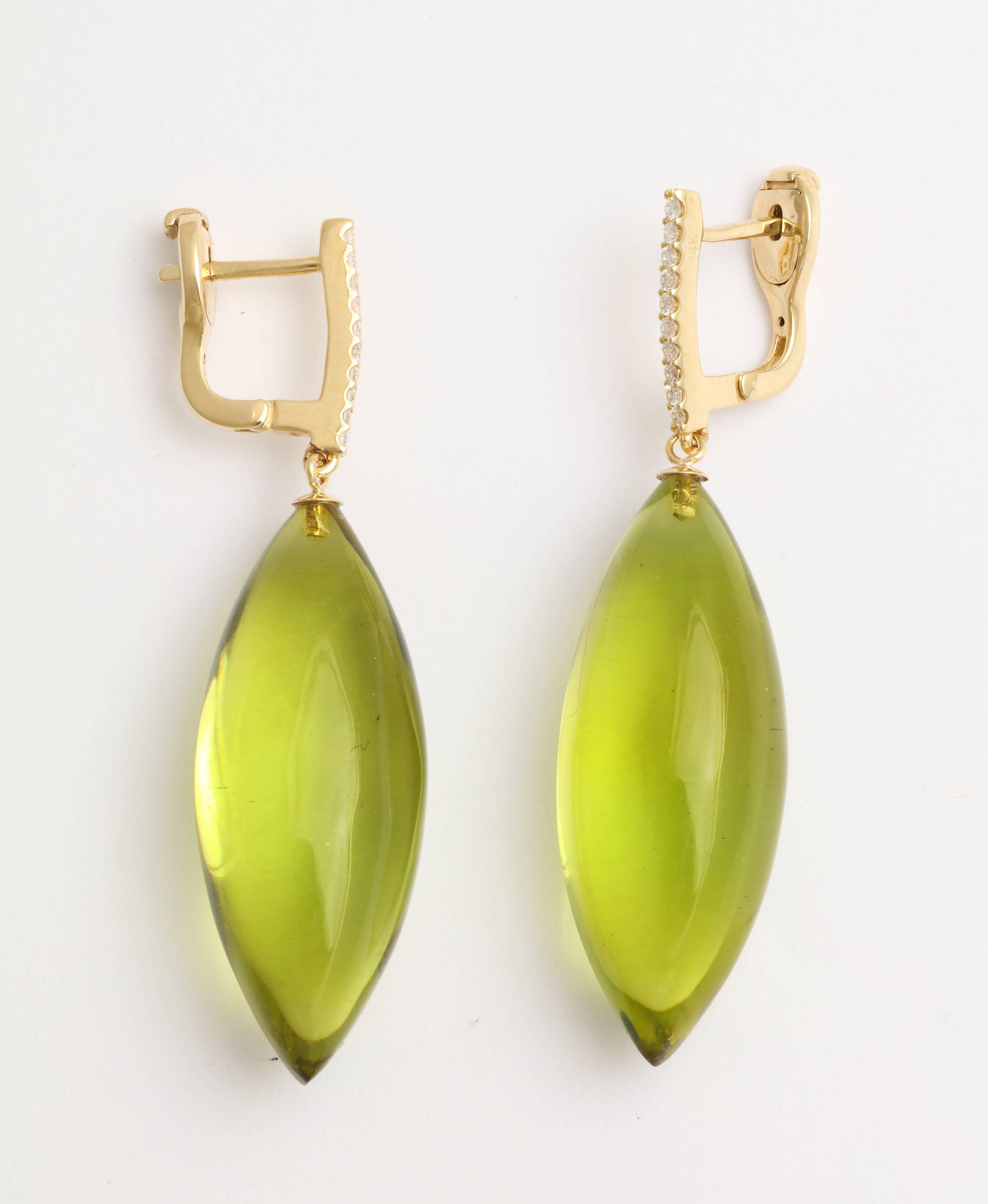 This very shade of green has just been voted Pantone's color of the year for 2017, so here is your chance to get a jump on the competition.  While measuring a full 1 3/4 inch (5cm) long, each earring only weighs 1/8 of an ounce (4g). The clever use