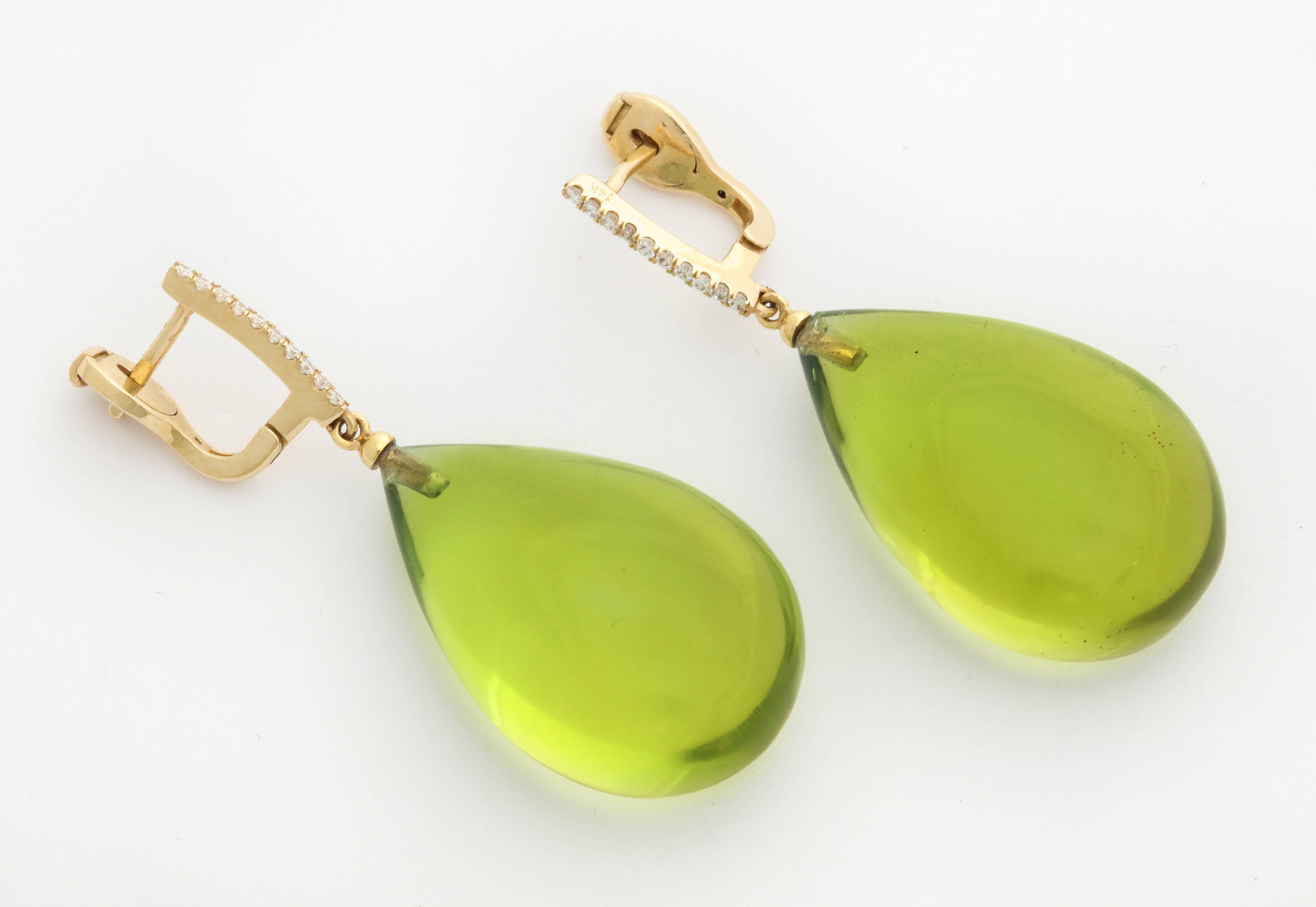 This very shade of green has just been voted Pantone's color of the year for 2017, so here is your chance to get a jump on the competition. While the drops measure an impressive 29x19mm, the earrings are light as a feather due to the clever use of