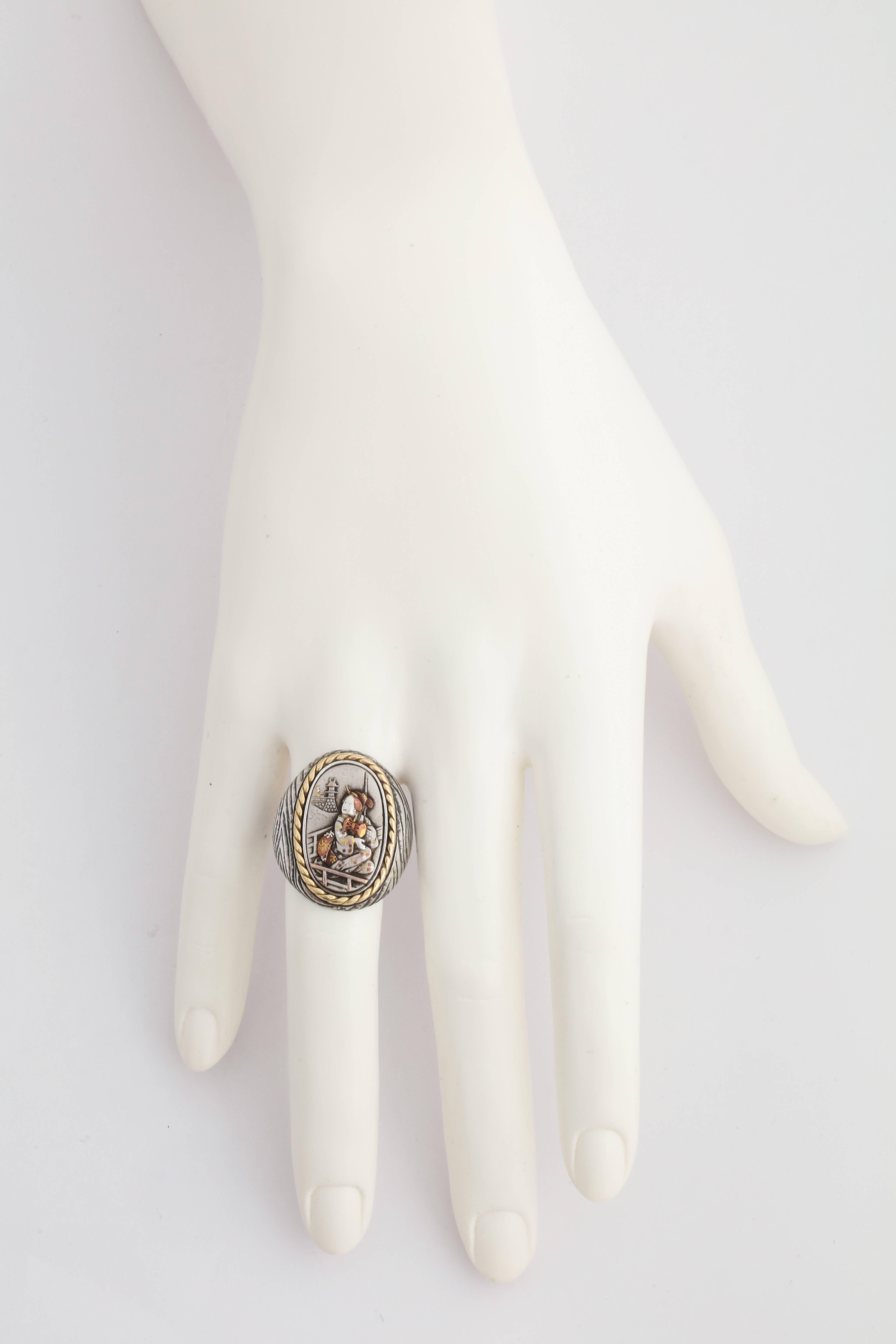 Harking back to her days of design with the antique jeweler Fred Leighton, Cooperman incorporates a vintage Japanese mixed metal object into this fabulous ring.  The center motif is made of silver, copper and gold, while the custom made ring is