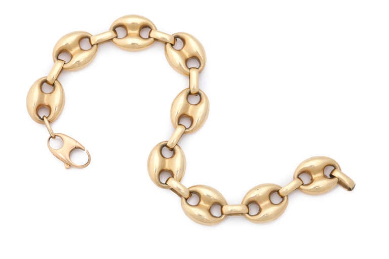 A charming 14kt yellow gold classic bracelet known as the mariner's link.  Easy to wear and stylish at 7.5 inches long.  The links are hollow, but in excellent condition, as would be expected in a bracelet of this type.  Total weight 17.8