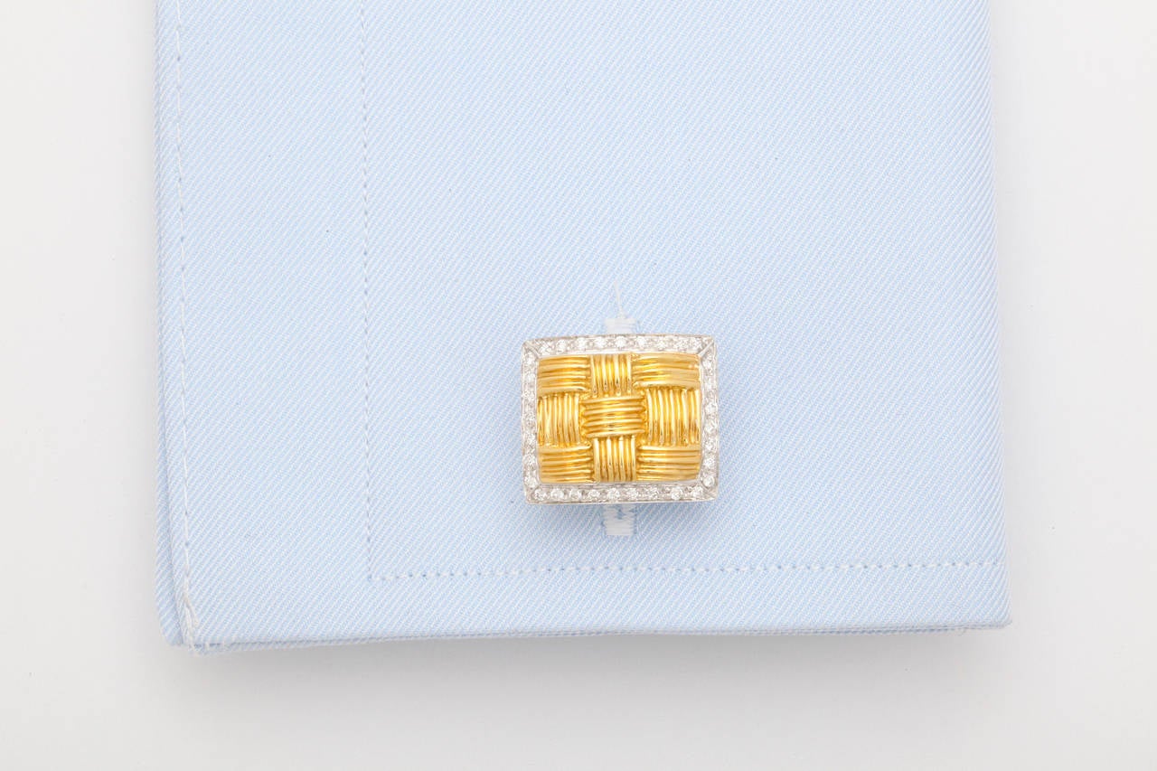 From the Magnifica collection, these glamorous cufflinks feature a yellow gold basket weave center bordered by diamonds (app. 1/2 carat total weight) set in white gold.  Finely crafted in Vicenza, Italy by Roberto Coin.  The reverse spring back set
