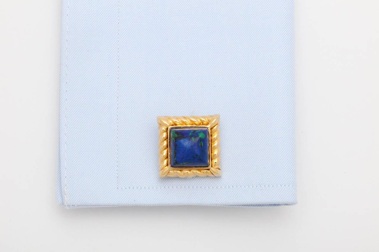 18kt fluted yellow gold frames and sugarloaf shaped azurite.  A classic look in a bold, David Webb size.  Current retail for similar designs from Webb is over $9,000.
